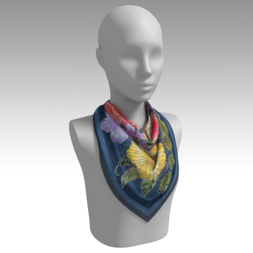 Mannequin wearing a colorful scarf with butterfly design on a gray background