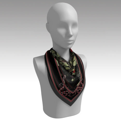 Mannequin wearing a patterned scarf on a plain background