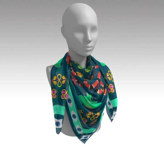 Colorful patterned scarf on a mannequin against a gray background