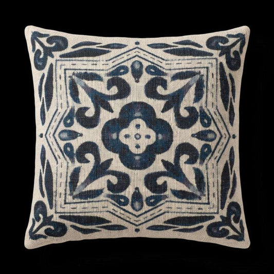 Decorative pillow with blue floral pattern on a black background