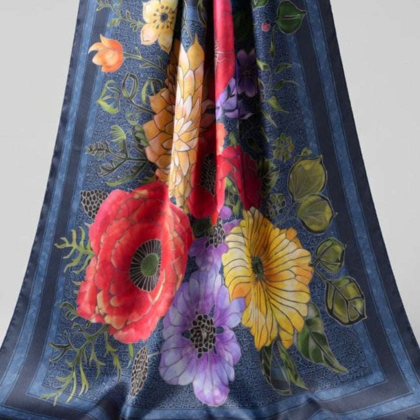 Colorful floral-patterned fabric on a plain background