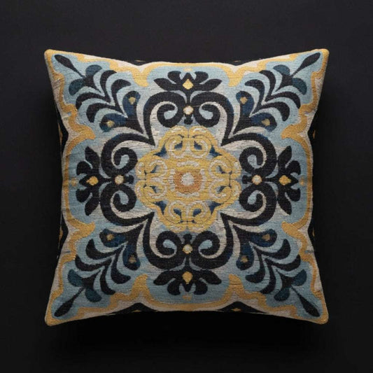 Decorative pillow with intricate patterns on a black background