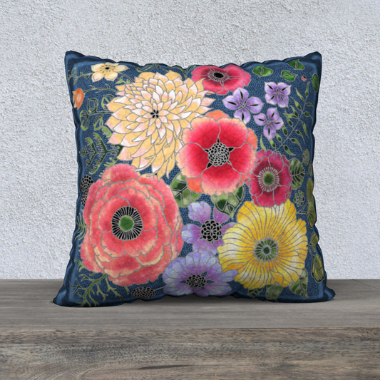 Floral-patterned pillow on a wooden surface with a textured wall background