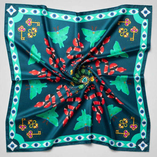 Colorful scarf with decorative patterns on a plain background